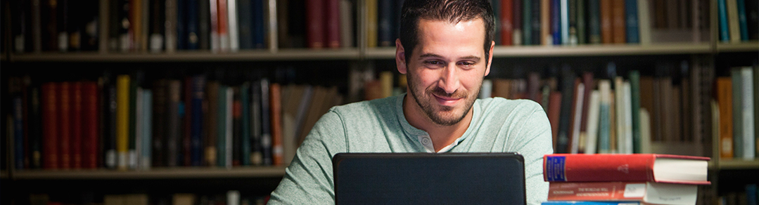 student studying in the library