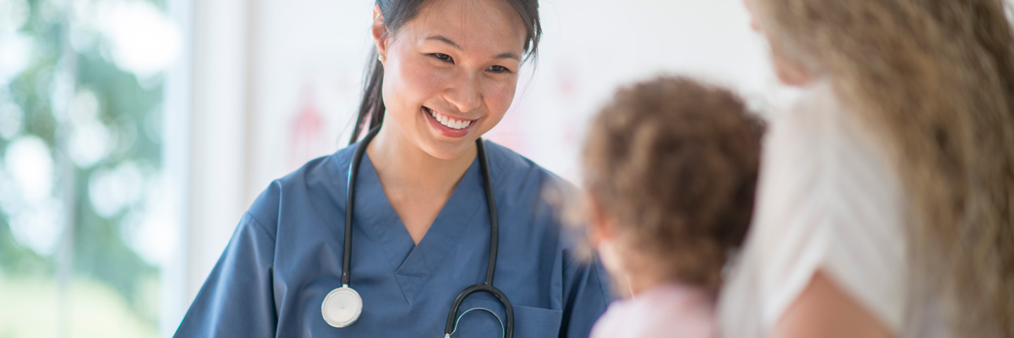 Nursing student smiling at patients