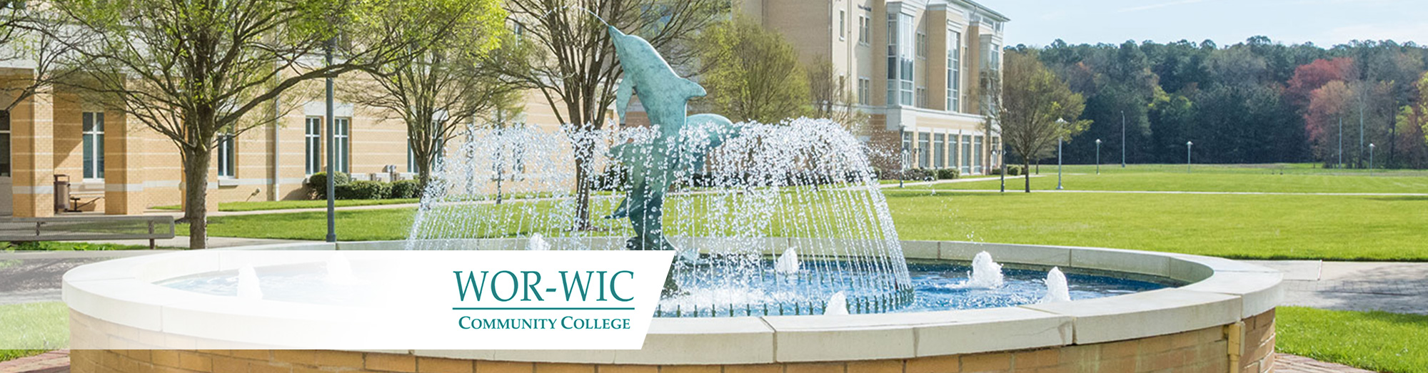 Wor-wic campus with a fountain in the foreground and the school campus in the background