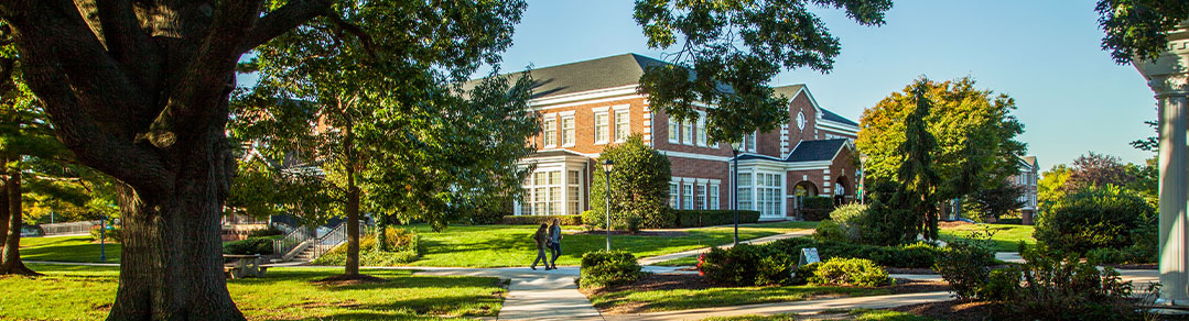 Wilmington University Campus with two people walking